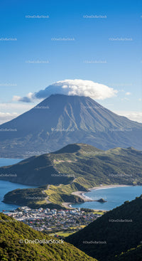 Majestic Volcano Surrounded by Lush Green Hills and Coastal Bay