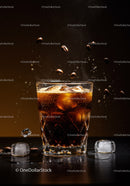 Iced coffee with floating beans and ice cubes