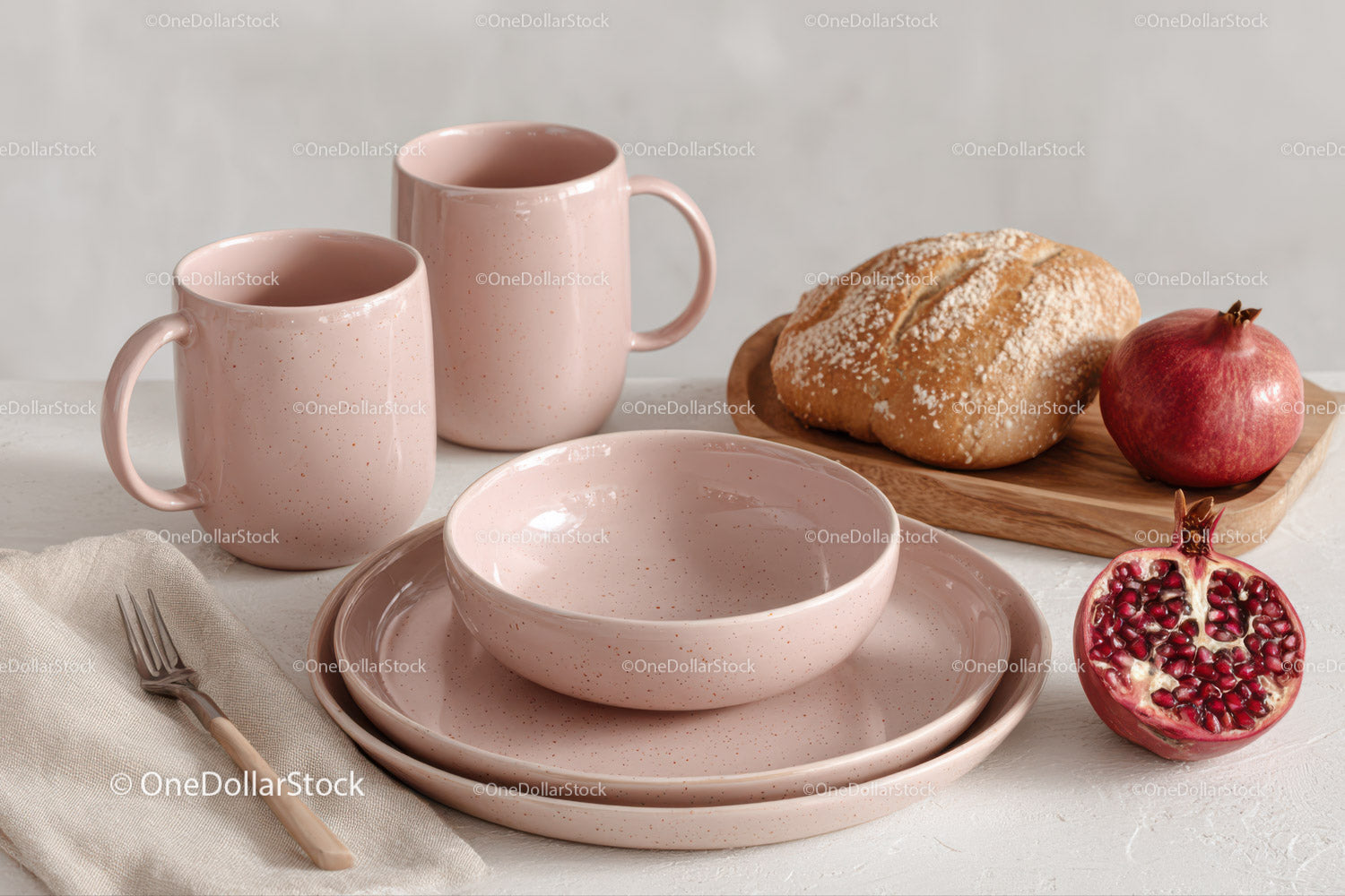 Elegant Ceramic Pink Tableware with Pomegranate and Bread for Breakfast