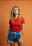 Thoughtful young woman in casual sporty outfit