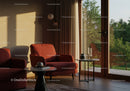 Cozy living room with red armchairs and natural light
