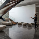 Modern minimalist lobby with wooden stairs and seating