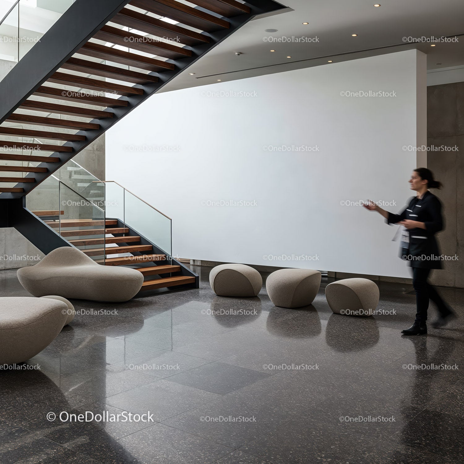 Modern minimalist lobby with wooden stairs and seating