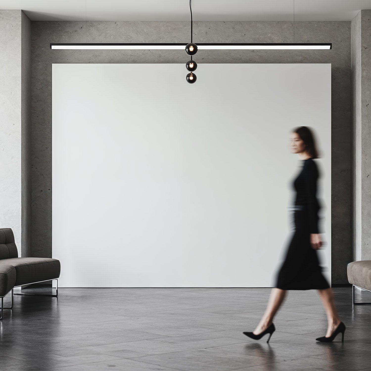 Woman in black dress walking through modern minimal interior
