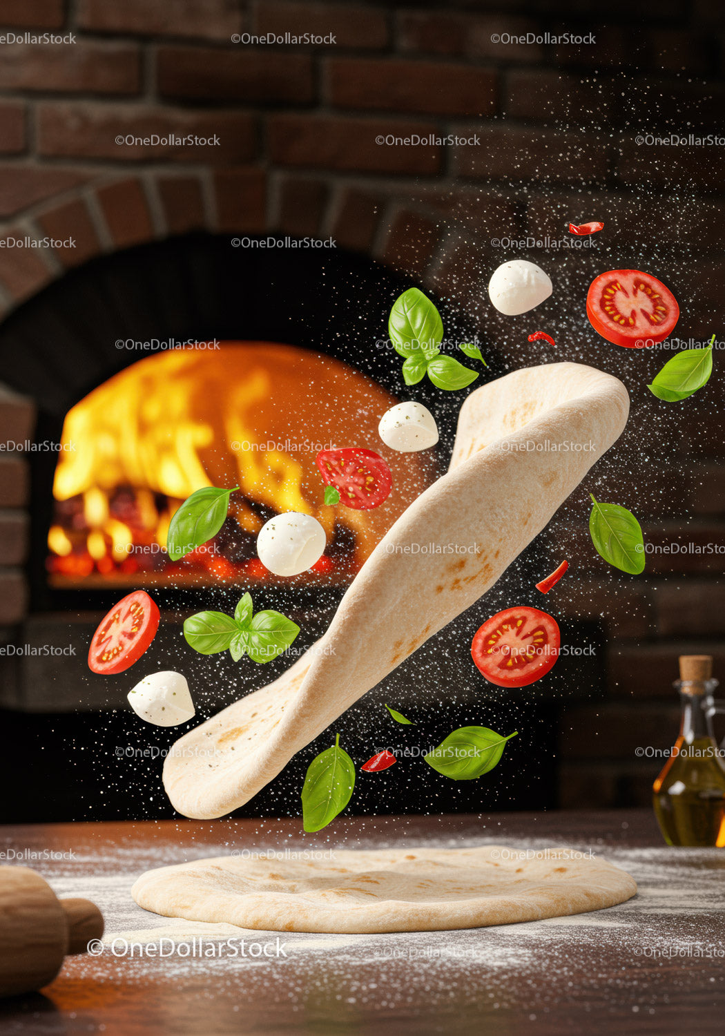 Fresh pizza dough tossing with ingredients midair