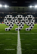 Three Soccer Ball Themed Numbers on Stadium Field