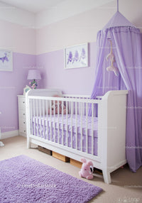 Cozy Nursery Room with Lavender Theme and Baby Crib