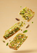 Close up of pistachio nut bars with honey glaze