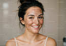 Happy Woman with Clear Skin after Face Treatment