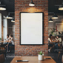 Blank poster on brick wall in cozy cafe interior