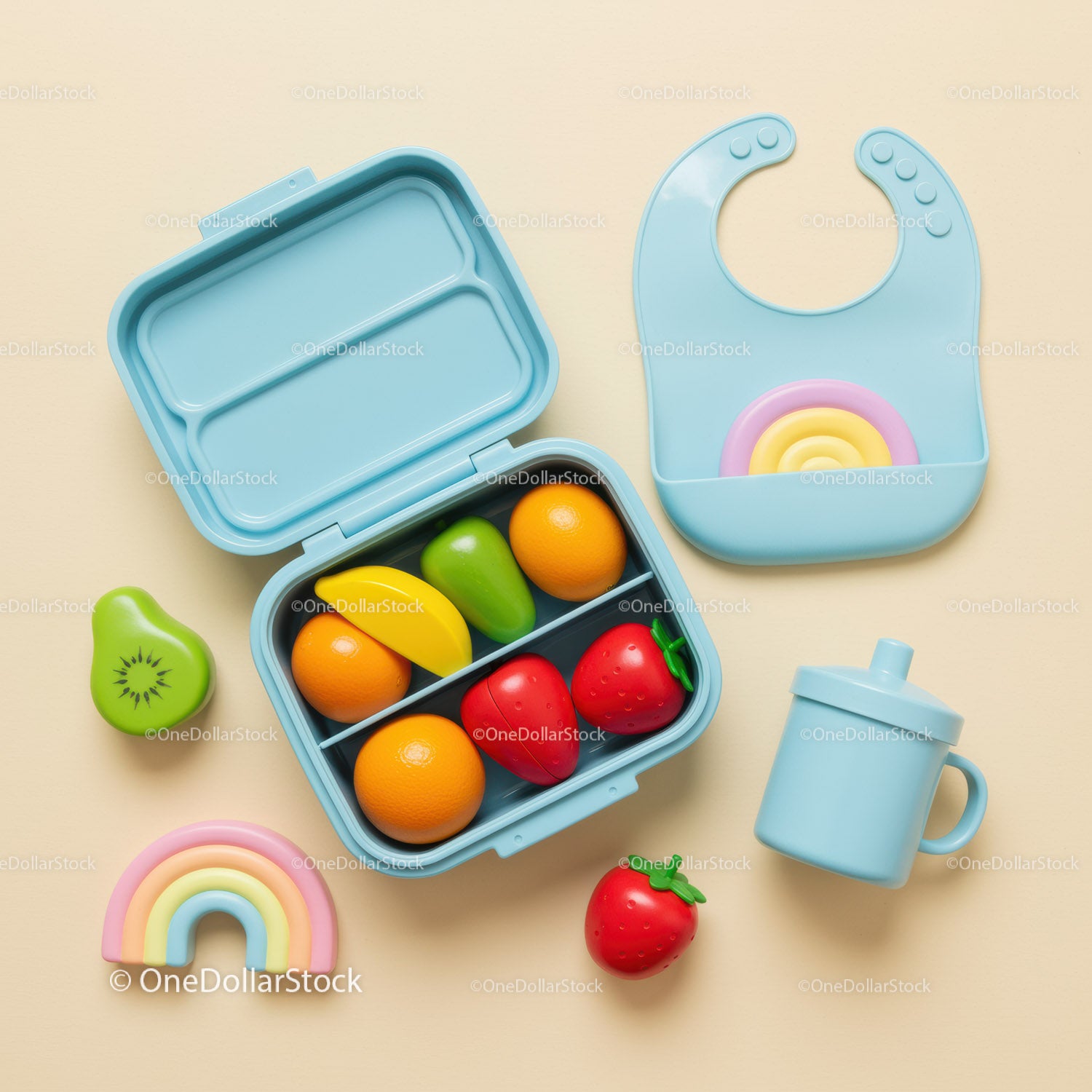 Colorful baby feeding set with toy fruits and accessories