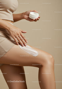 Elegant Woman Applying Body Moisturizer with Cream Jar