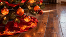 Close-up of Christmas tree with fiery orange ornaments