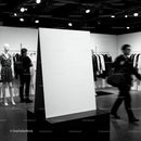 Blank Display Board in Modern Fashion Store Interior