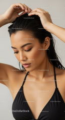 Elegant Portrait of a Woman in Black Swimsuit with Smooth Skin