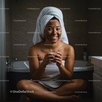 Happy Woman Enjoying Skincare Treatment and Relaxation at Home