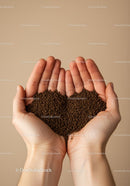 Hands Holding Coffee Granules Forming Heart Shape