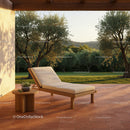 Outdoor Lounge Chair with Side Table Amid Green Trees and Sunny Landscape