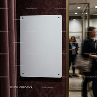 Blank white board on textured office wall