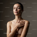 Serene woman embracing natural beauty with closed eyes