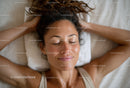Relaxing Woman Receiving Head Massage For Skin Wellness