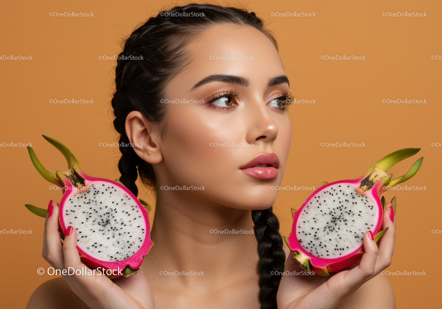 Portrait of a Woman Holding Halved Dragon Fruits with Vibrant Colors