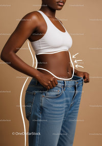 Woman Measuring Waist in Oversized Jeans Casual Summer Fashion