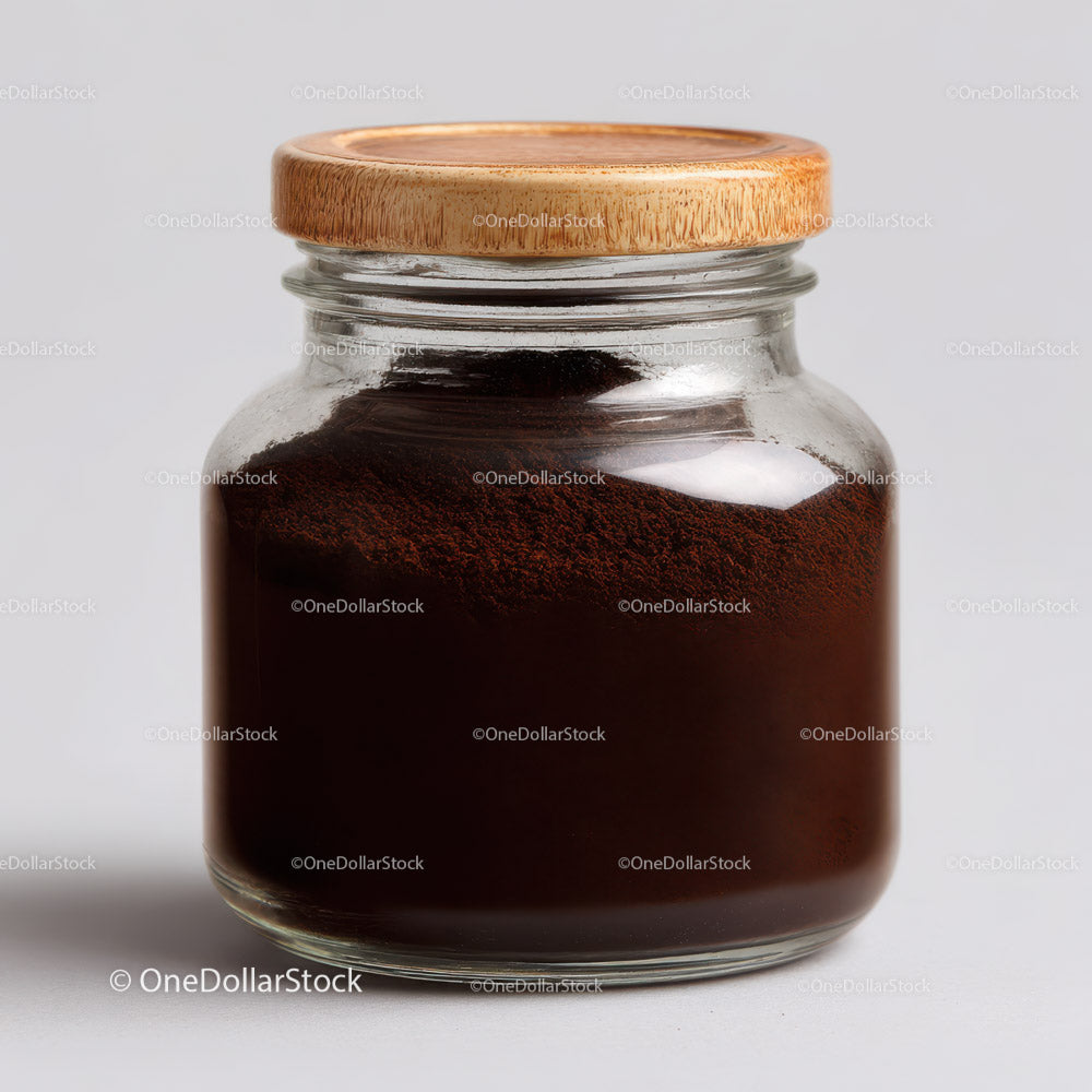 Glass Jar Filled with Dark Brown Spice Powder for Cooking