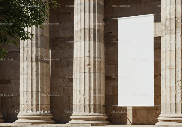 Blank banner hanging between ancient stone columns JPG Mockup Image