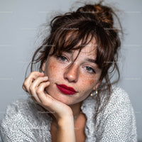 Close-up Portrait of Young Woman with Freckles and Red Lips