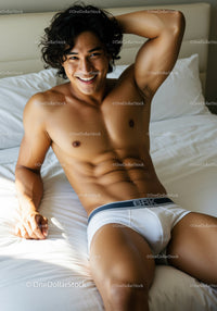 Smiling athletic man relaxing on bed in white underwear