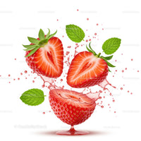 Fresh strawberry halves with mint leaves and splash