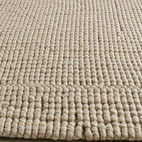 Beige Woven Rug with Textured Fabric for Cozy Home Decor