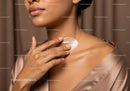 Close-up of a Woman Applying Facial Moisturizer for Glowing Skin