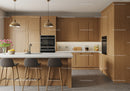 Contemporary Wooden Kitchen with Grey Bar Stools and Modern Appliances