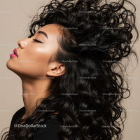 Profile of confident woman with voluminous curly hair