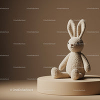 Soft Plush Bunny Sitting on Round Pedestal