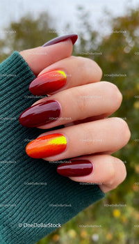 Autumn-inspired glossy manicure with vibrant shimmer