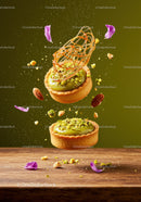 Pistachio tarts with caramel decoration and floral petals