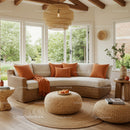 Cozy sunlit living room with wicker furniture and cushions