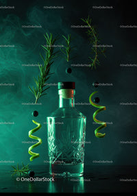 Elegant glass bottle with fresh herbs and citrus twists