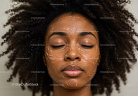 Young Woman Relaxing with Clay Facial Mask and Curly Hair