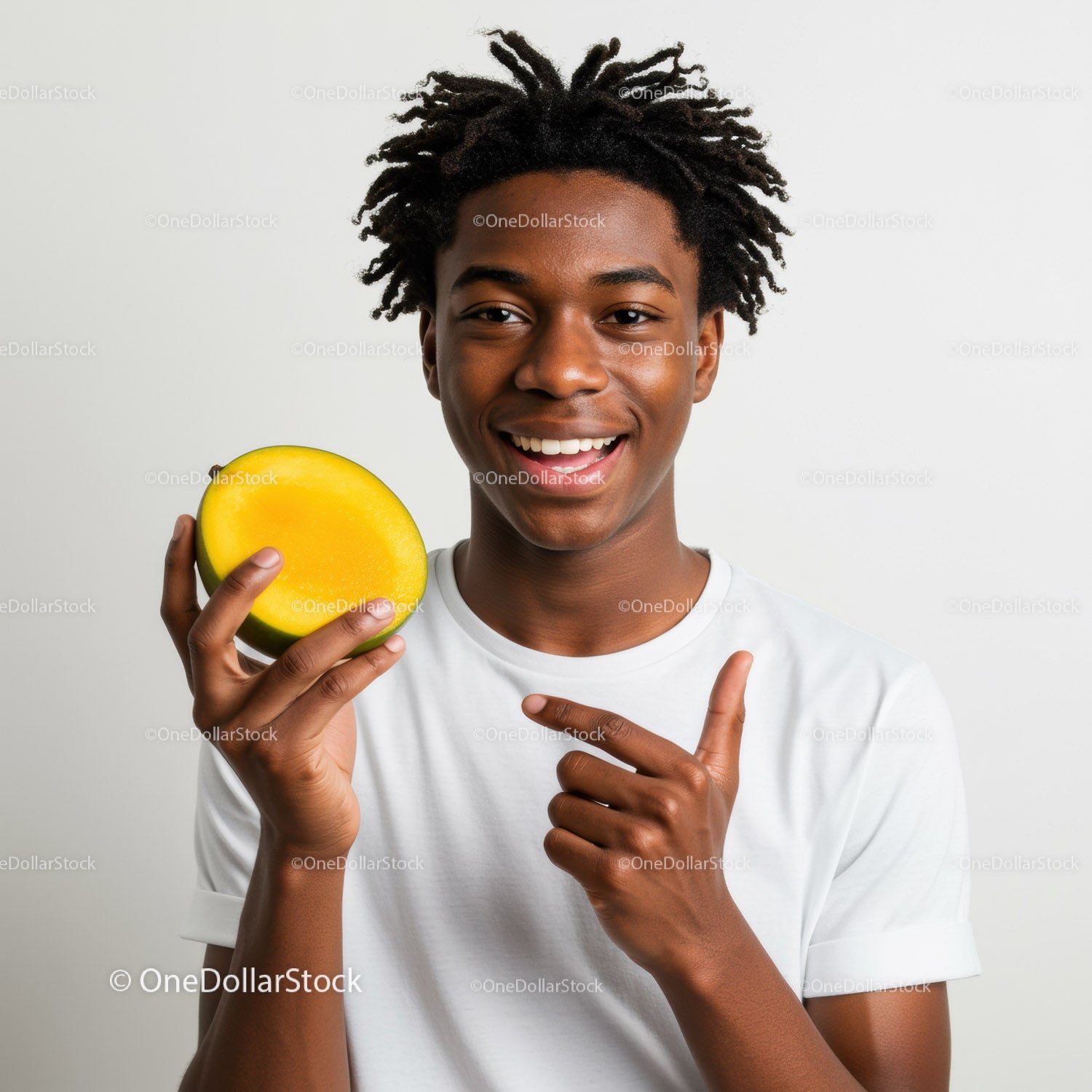 Smiling Young Man Holding a Yellow Melon in Bright Studio Setting