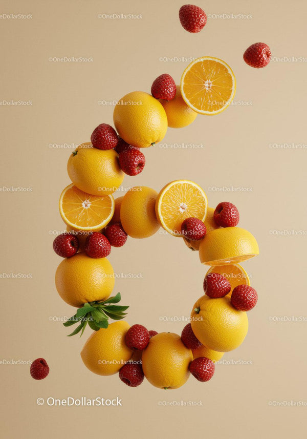 Fresh citrus and strawberries floating on beige background