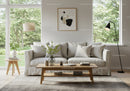 Cozy modern living room with natural light and soft colors