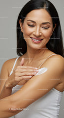Woman Applying Sunscreen for Healthy Glowing Skin