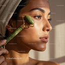 Beauty Woman Using Jade Roller for Glowing Skin and Facial Relaxation