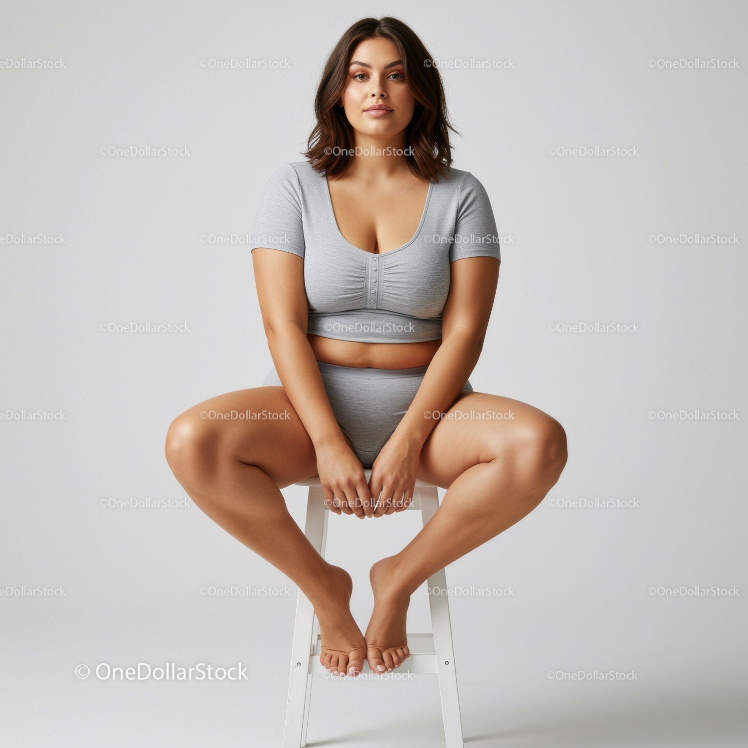 Young Woman Sitting in Casual Outfit on White Stool for Lifestyle and Fashion