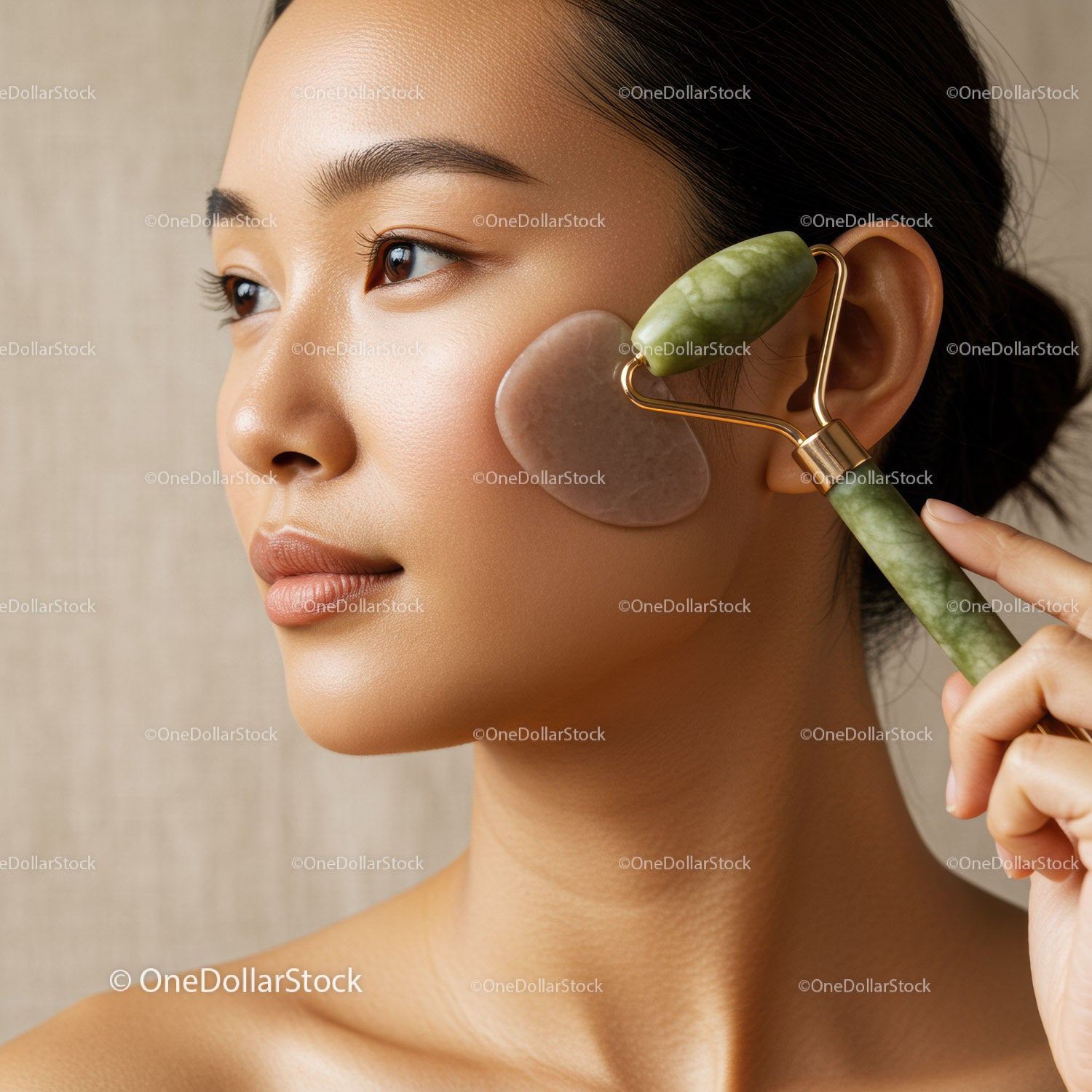 Woman Using Jade Roller for Facial Massage and Skin Rejuvenation