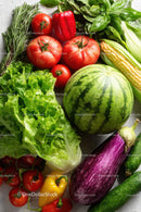 Vibrant Fresh Vegetables and Fruits on a Rustic Surface